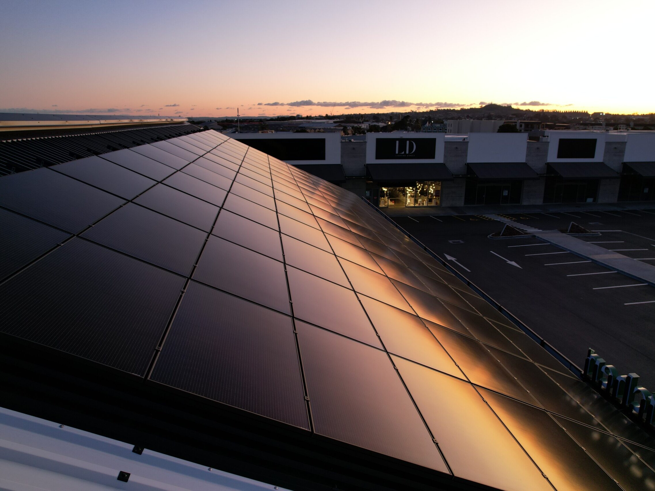 Black solar roof in the sunset