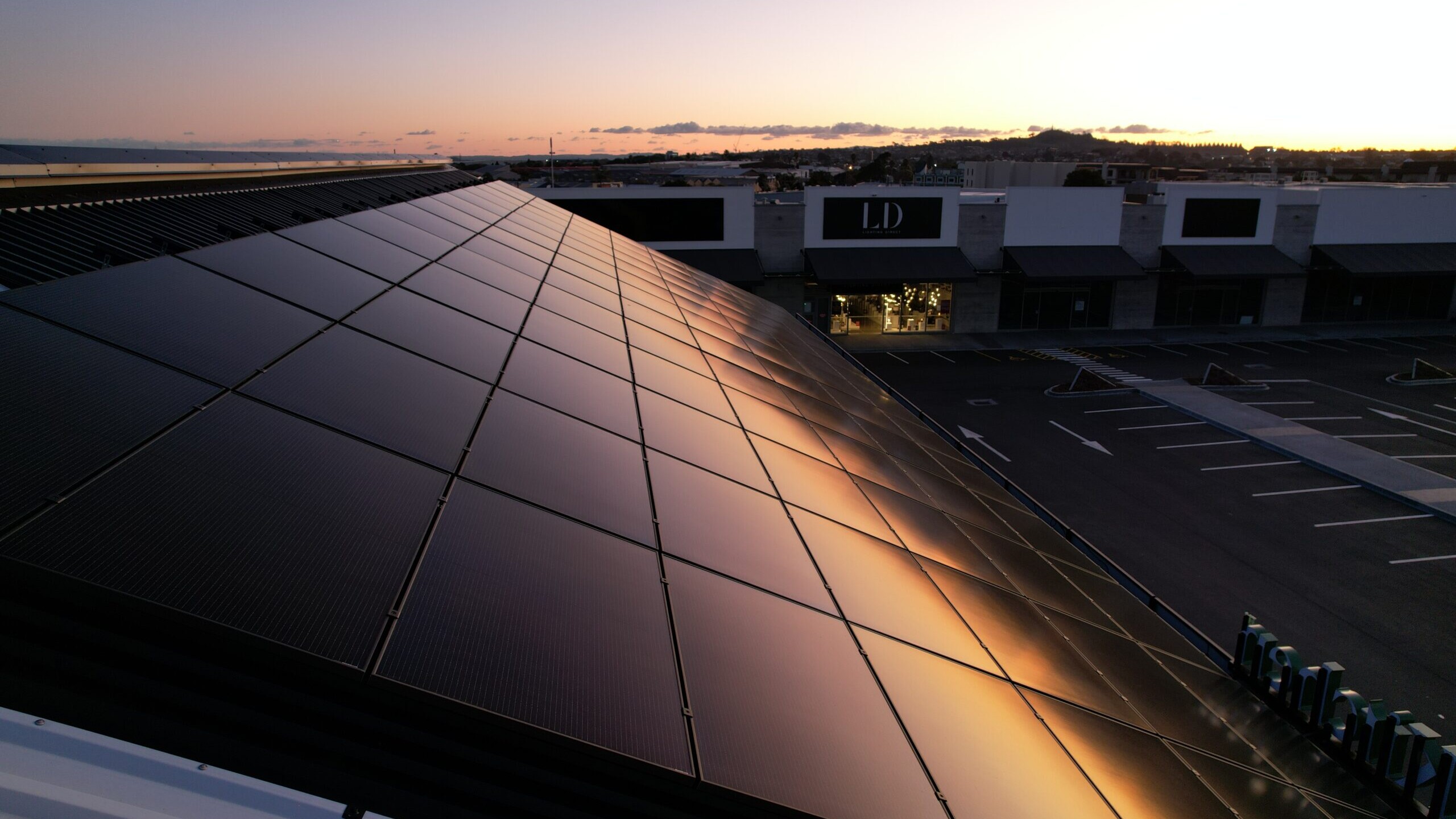 Black solar roof in the sunset