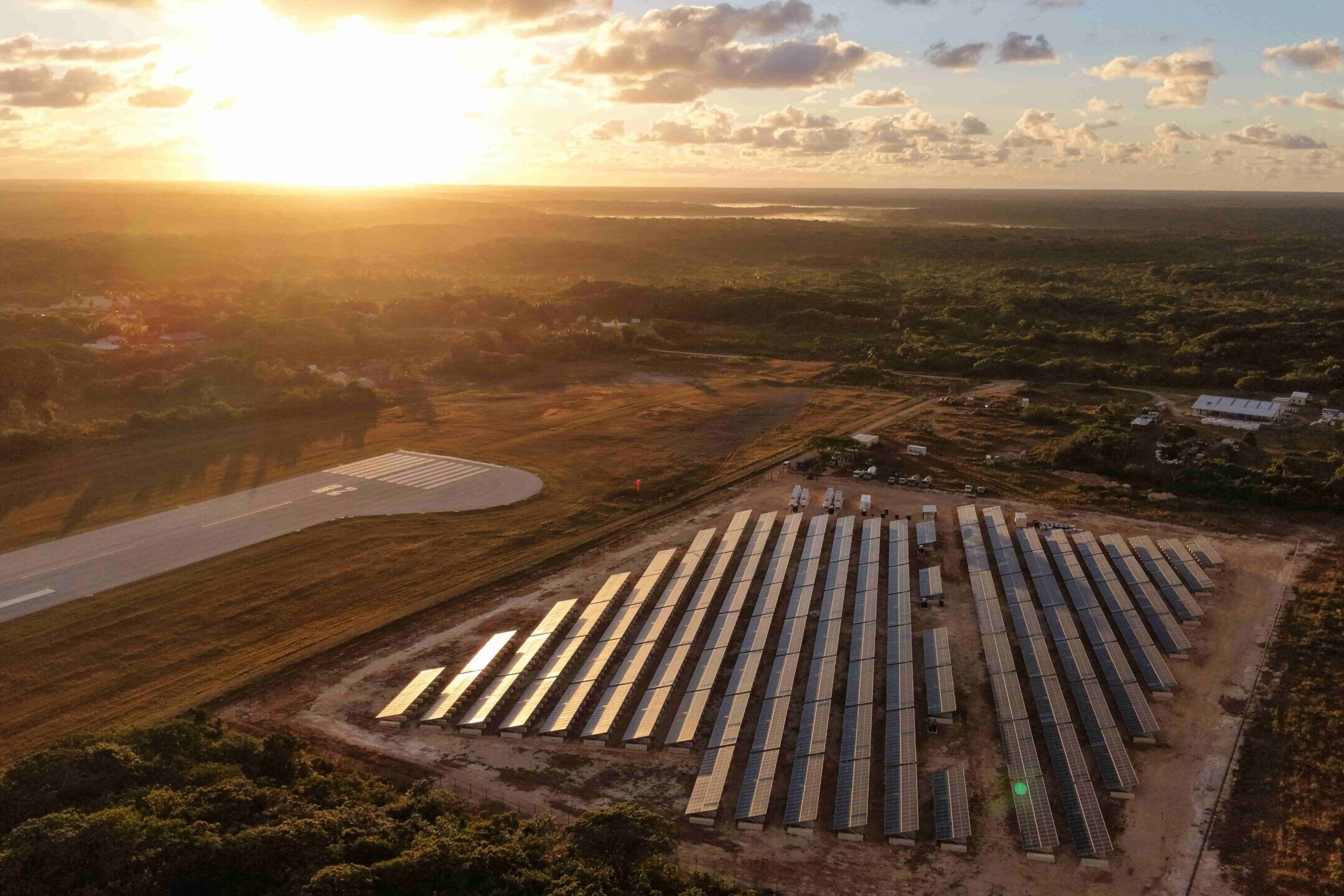 Renewable Energy Project with Solar Array at Sunset